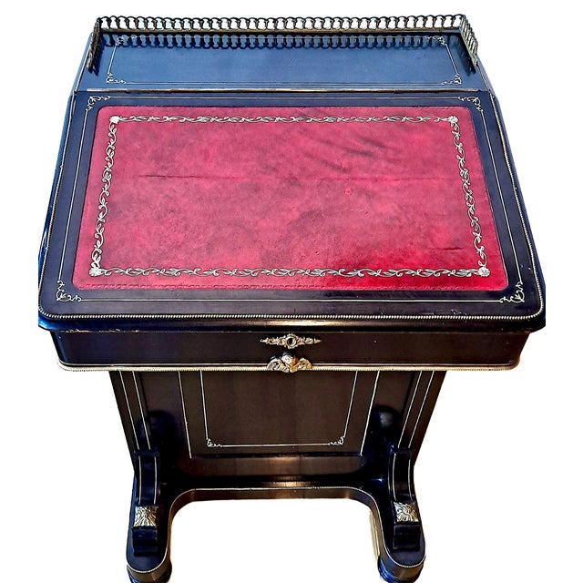 On offer is a late 19th-century Victorian Davenport desk. This distinctively styled compact writing cabinet was named...