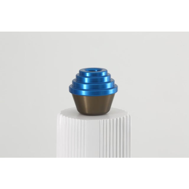 TheMykonosvase is constructed with two modules of high-quality solid aluminum, assembled with precision threads designed...