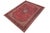 A beautiful hand-knotted wool rug measuring approximately 9'11" x 13'0". This large room-sized carpet features a vibrant...