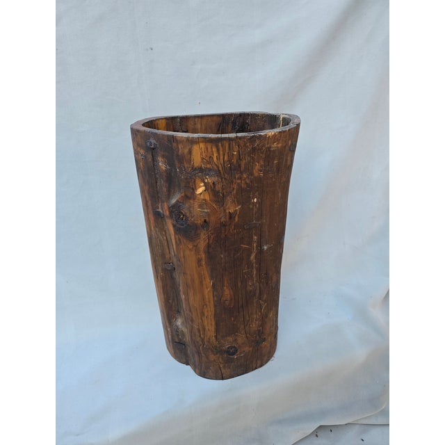 This is a natural wood vessel with lots of character. This could be used to hold a plant or even a piece of glass to...