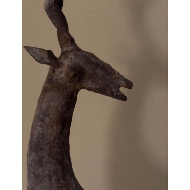 Large, stately deer statue, likely brass, with perfectly rustic patina and rust. Marked ‘made in India’ on base. Measures...