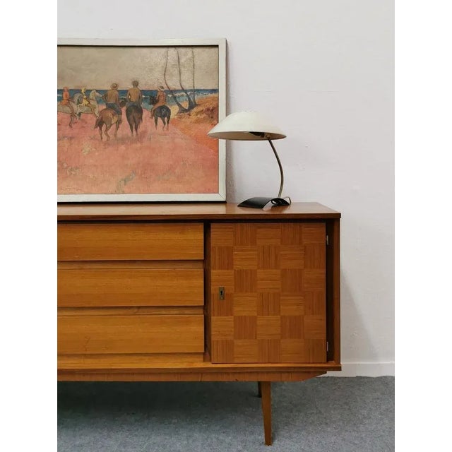 This desk lamp was designed by the Bauhaus designer Christian Dell in the 1930s as a model 6840 for Kaiser Idell. A unique...