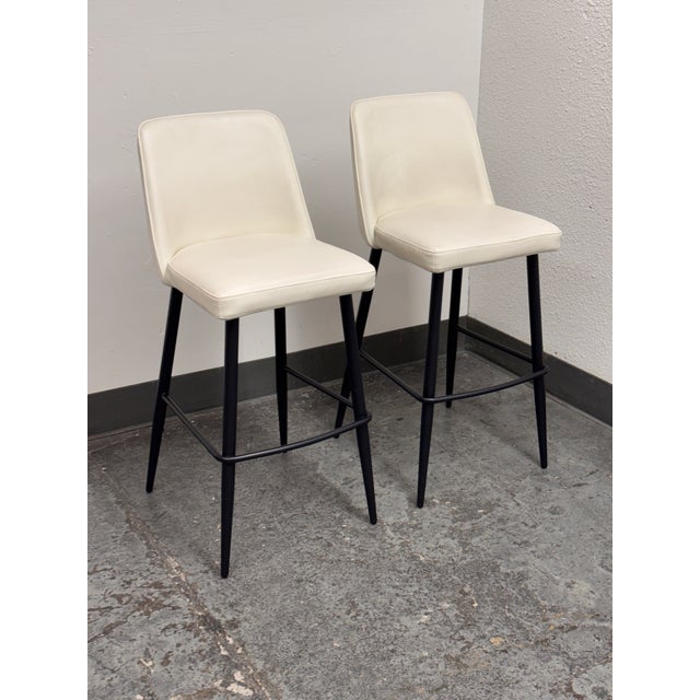 Design Plus Gallery presents a Pair of Emelia Contemporary Bar Stools by Moe’s Home Collection. The stools offer a...