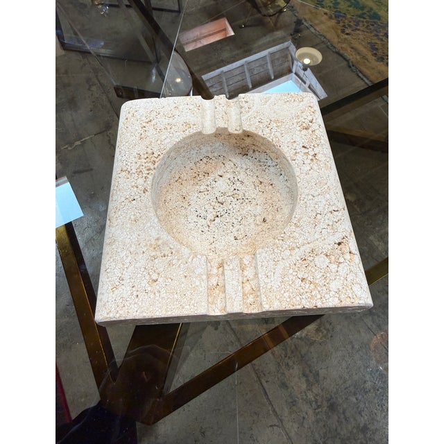 A sculptural square ashtray produced by Fratelli Mannelli in Signa (Florence), Italy, during the 1970s. Carved from solid...