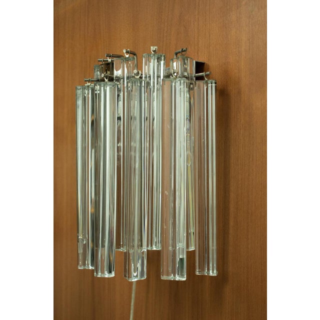 Novaresi wall lamp with murano glass from italy. The lamp is made in the 60s. All glass pieces are clear except one. That...