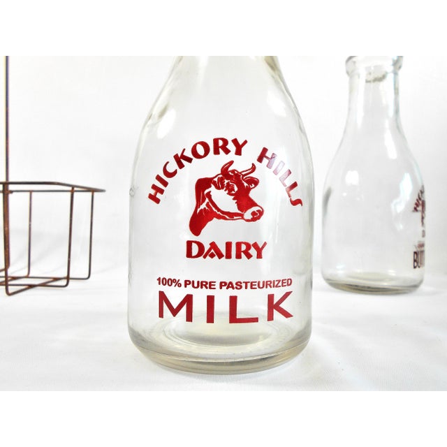 Two Vintage Milk Bottles and Metal Carrier With Wood ...