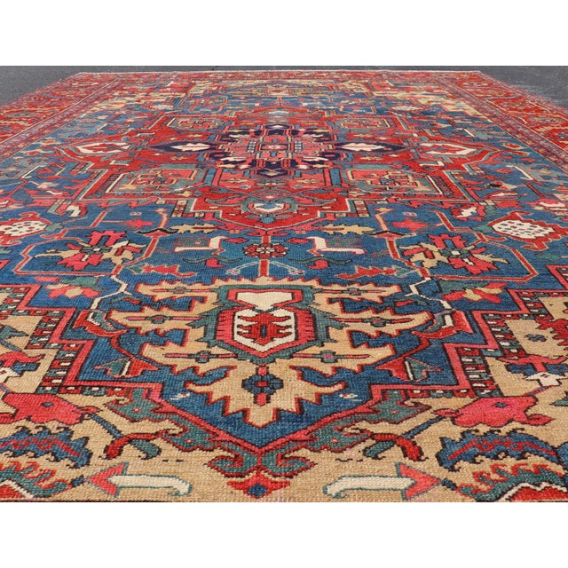 Measures: 10'2 x 14'8 Antique Persian Heriz Serapi Rug with Blue Field Geometric Medallion Design. Keivan Woven Arts/...
