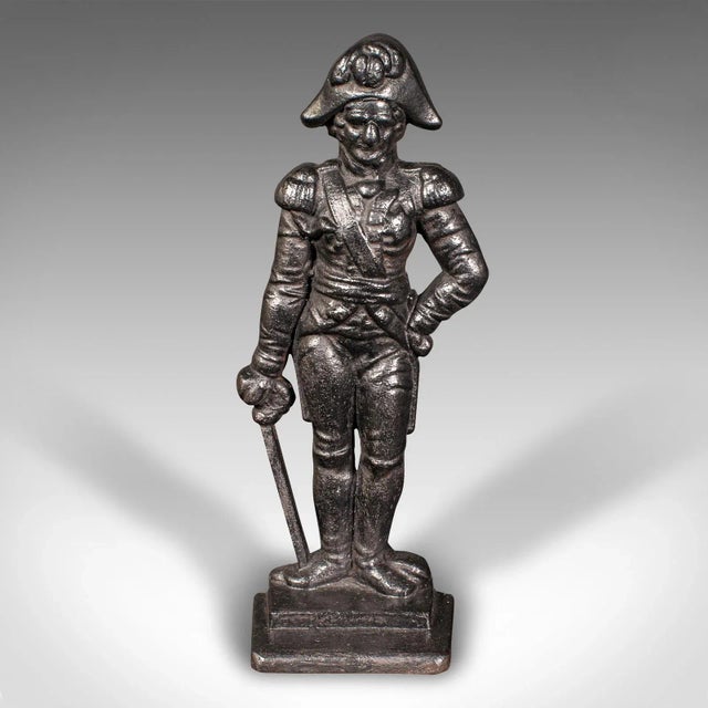 This is an antique figural doorstop. An English, cast iron Lord Nelson door keeper, dating to the Regency period, circa...