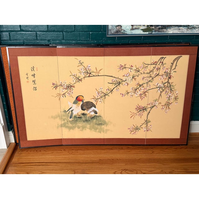 Beautiful coordinated pair of vintage four-panel Asian byōbu-style wall screens featuring birds, flowering branches and...