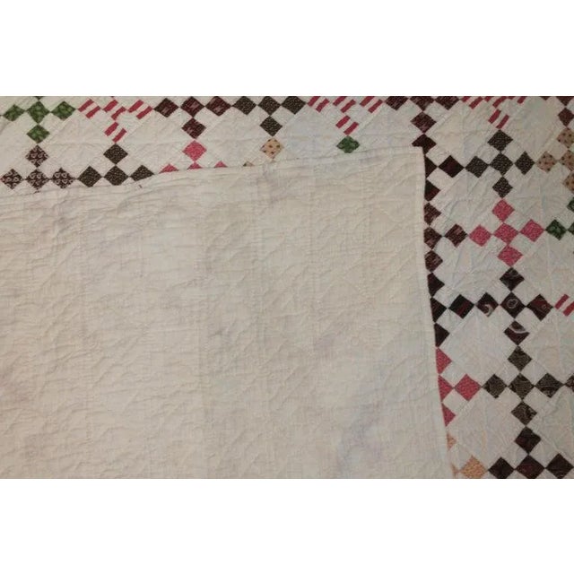 19th century mini postage stamp chain in early calico fabrics. This is tiny little blocks in pristine condition. From...