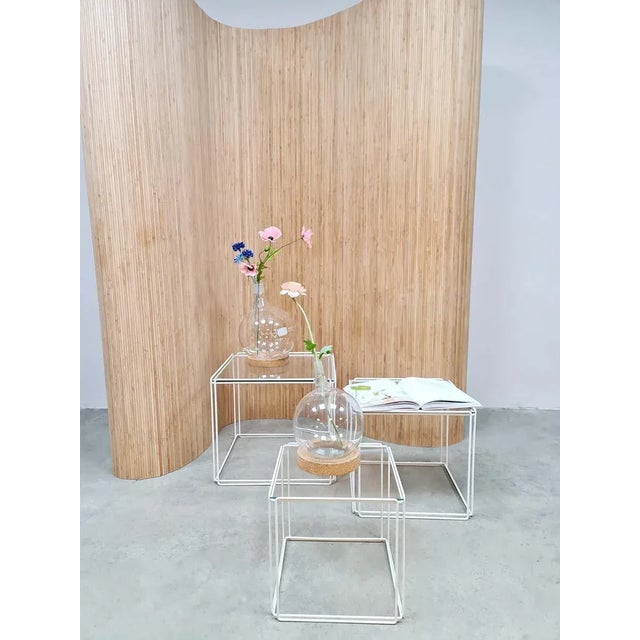 We love minimalism! This stylish cubist set of side tables is minimalist design by the French designer Max Sauze. Model:...