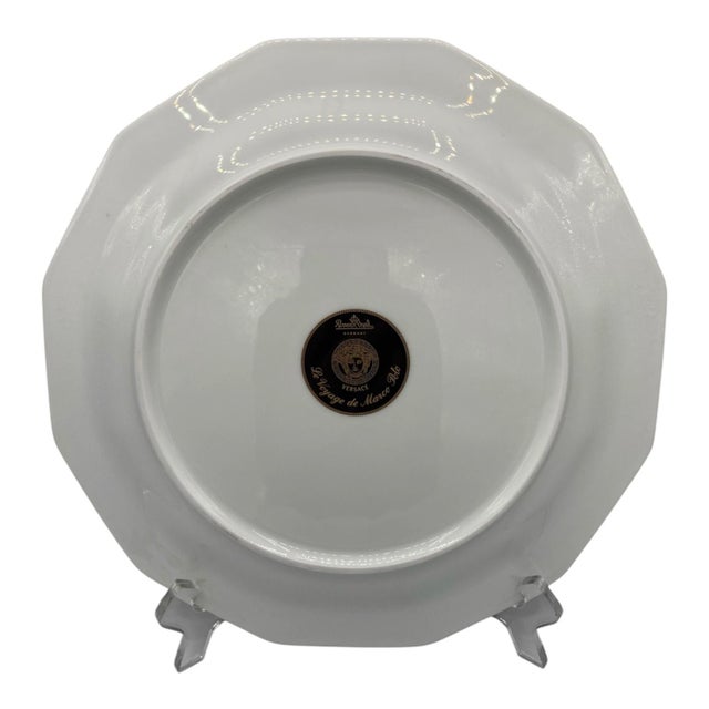 Designed in Italy by Gianni Versace for Rosenthal. "Le voyage de Marco Polo" porcelain service plate with gold decoration...
