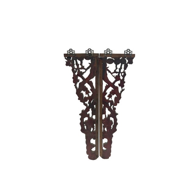 Behold the Pair of Chinese Vintage Golden Flower Carving Corner Triangle Shape Wood Wall Art, a mesmerizing fusion of...