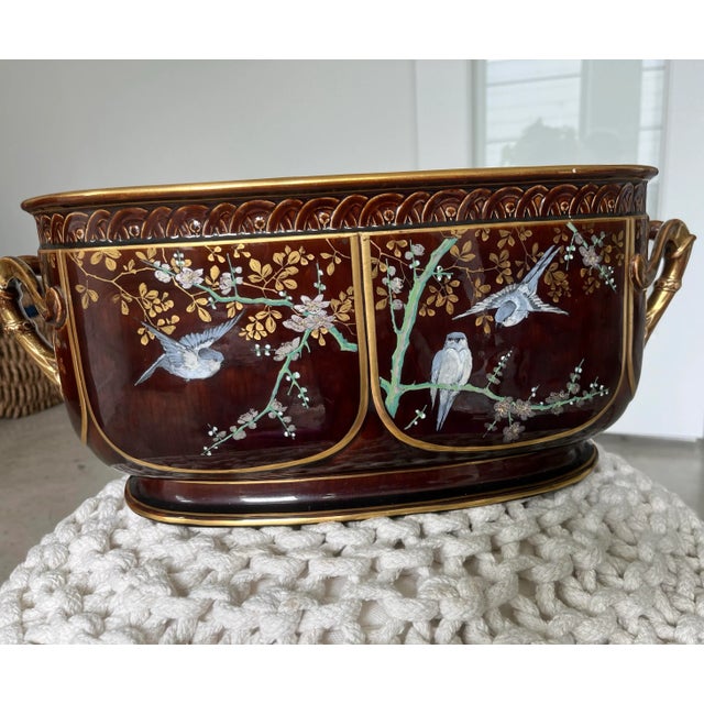 This absolutely stunning, antique, Hippolyte Boulenger jardiniere is decorated in an intricate and delicate Asian motif...