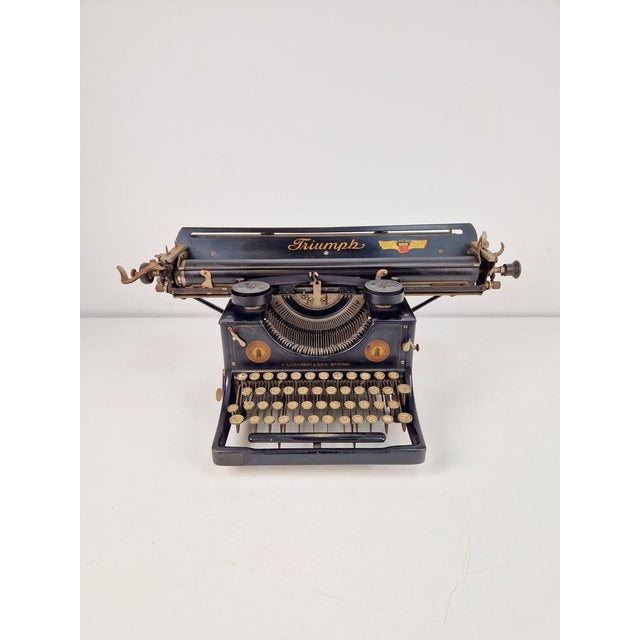 Vintage Truimph typewriter made of metal, steel, and chrome, Germany, 1915 The entire machine is in good condition. The...