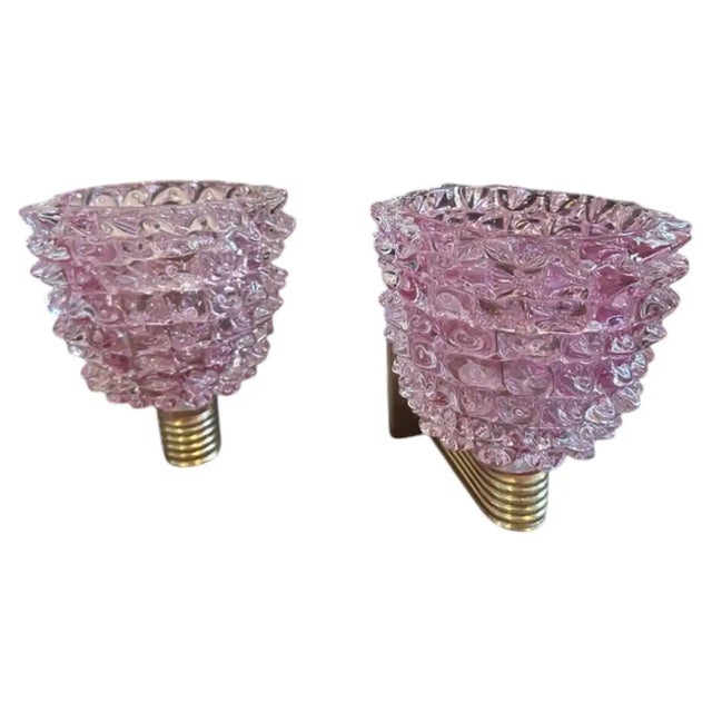 A pair of wall lights designed and manufactured in Italy in the style of Barovier, which invented this particular glass...