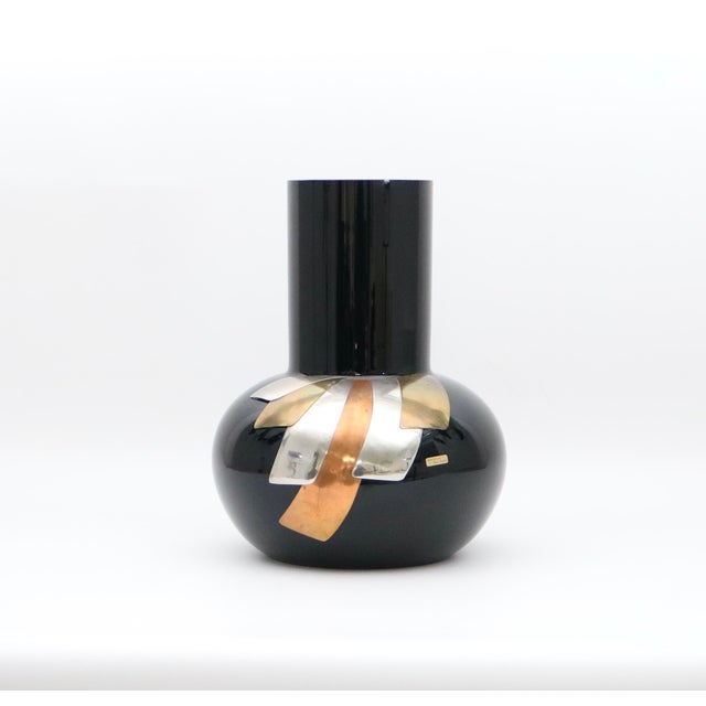 Black Murano glass vase with metal accents designed by Luca Bojola for Art in Luce the vase was designed and made in the...