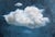Cloud by Caitlin Hurd | Oil on Paper White cloud against a blue background. For Sale