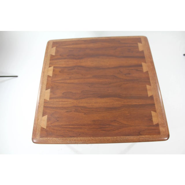 This is a great versatile table made of Walnut in the 70s and has a big draw for storage you can use it as an end table...