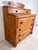 A wonderfully proportioned American Empire chest of two-over-four drawers in solid quilted tiger maple, ca. 1820s. From a...