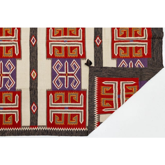 Elevate high-end interiors with this striking Modern Navajo Style Hand-Woven Wool Rug, an exquisite fusion of traditional...