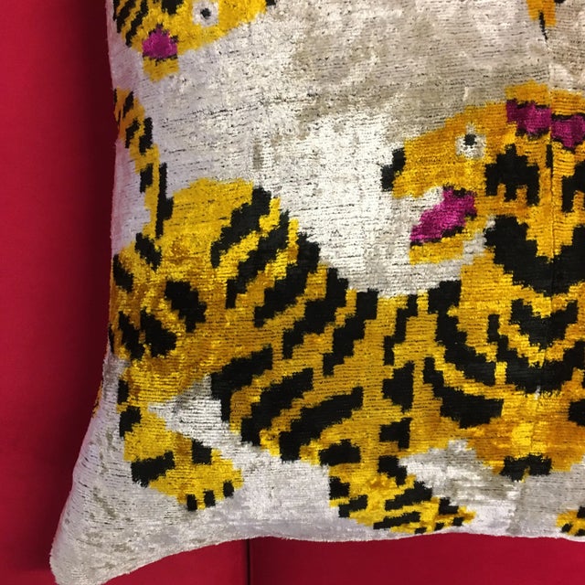 Silk velvet animal print pillow with new feather down insert. The animal print mimics itself showing it 4 times. Very...