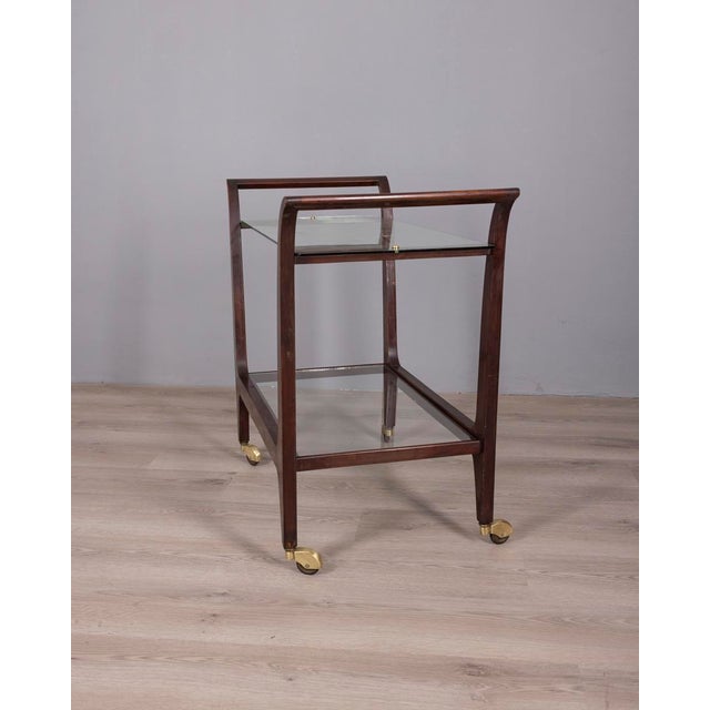 Food trolley with wooden frame, glass shelves and gold-plated brass wheels, Italian design, 1940s.