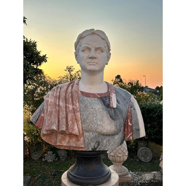 Introducing an impressive Italian Marble Bust of an Emperor, exquisitely carved from colorful marbles sourced from Italian...