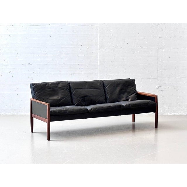 An elegant three-seater mid-century sofa by danish designer hans olsen for vatne møbler. Made in denmark, this sofa...