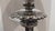 Handsome pair of cast silvered bronze column lamps. Tall candlestick style with fluted body and nice detail along the base...