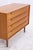 Vintage teak chest of drawers from WK Möbel with four spacious drawers and the characteristic long handles. The clean...