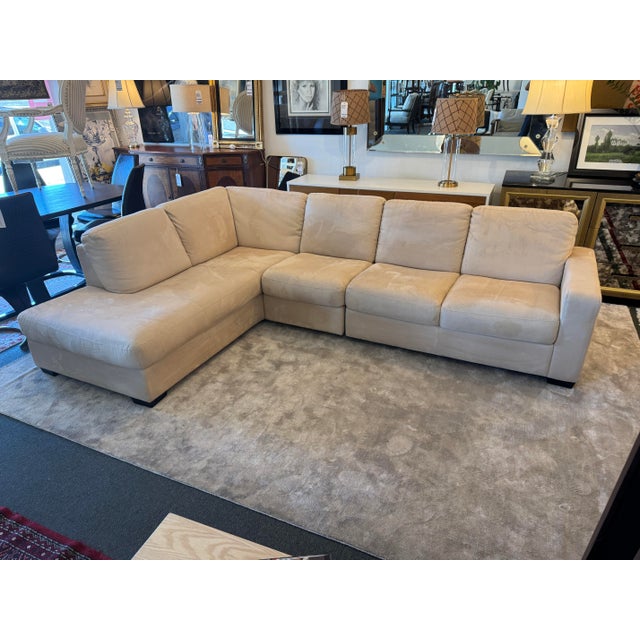 Design Plus Gallery presents an ITALSOFA Microsuede Cream Sectional. Upholstered in cream-colored microsuede, this...