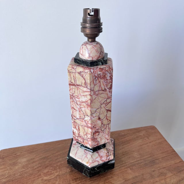 A striking pair of Italian mid-century table lamps, combining two contrasting marbles to great effect. The richly veined...