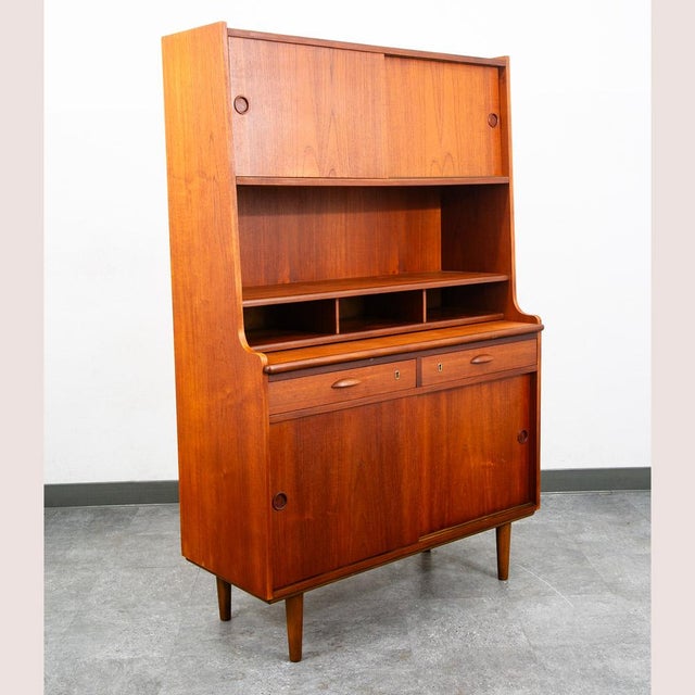 Vintage Danish modern bureau from the 1960s-1970s - a classic Danish design. A exceptional form finished with teak veneer...