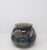 This stoneware vessel was designed by renowned Texas artist Ishmael Soto. It features tactile qualities in a masterfully...