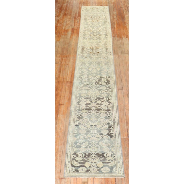 An early 20th century skinny Decorative original size Persian Malayer long runner. Measures: 2'' x 15'.