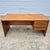 This is a handsome Danish modern style teak veneer executive desk that is unsigned but likely made in the 1970s. The desk...