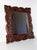 Beautiful vintage wall mirror with an ornate hand-carved wooden frame featuring flowing scroll and foliate motifs. The...