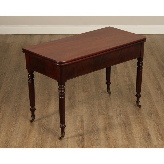 High Quality Antique 19th Century Mahogany Games Table with Folding Top and Mounted on Rolling Casters