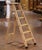 Crafted in France circa 1960, this antique six-step folding ladder blends rustic charm with mid century functionality....