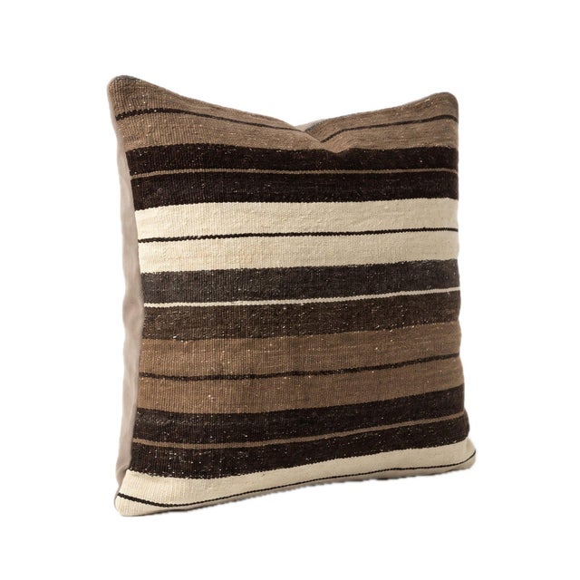 This beautiful 19'' x 19'' pillow cover was made from authentic Turkish Kilim pieces. Bright colors of wool adorn the...
