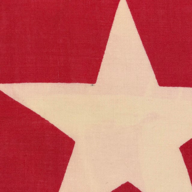 This vintage Cuban flag is made from a thin woolen cloth, with printed star and stripes visible on both sides. Please note...