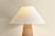 The Forest Heights table lamp reimagines a familiar silhouette with a distinctive materiality. A tightly coiled and lashed...