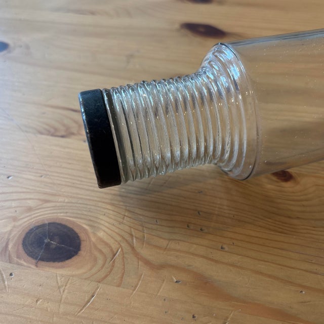 Art Deco collectible glass rolling pin complete with metal cap. The cap has minor dings and scratches as shown.