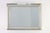 A striking Hollywood Regency mirror by Deknudt, crafted in Belgium around 1980, combining sculptural glamour with the...