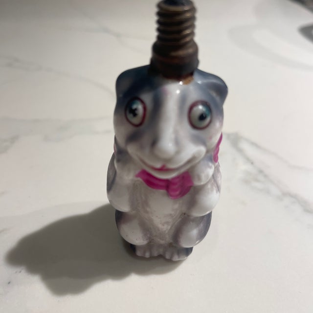 This thoughtfully assembled vintage figural ornament and curio set brings together a charming mix of hand-blown glass,...