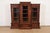 A gorgeous antique Eastlake Victorian or Renaissance Revival triple bookcase cabinet or display cabinet In the manner of...
