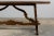 Late 19th century Spanish Renaissance Revival walnut trestle table, sourced in Provence, France. The rectangular top is...