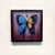 This artwork features a striking hybrid butterfly, its wings painted in vibrant shades of blue and orange, creating a...