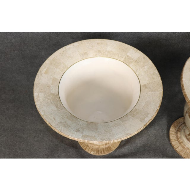 This impressive pair of large Italian tessellated marble urns is conceived in the classical Campana tradition, combining...
